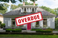 Overdue stamp over a home; delinquent property taxes in Texas