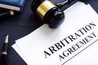 Arbitration agreement and gavel on a desk; texas property tax arbitration